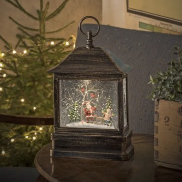 SHOWROOMMODEL - Konstsmide kerstverlichting - sneeuwlantaarn met kerstman en kind op batterijen - 17,5 x 8,5 x 25 cm - bruin